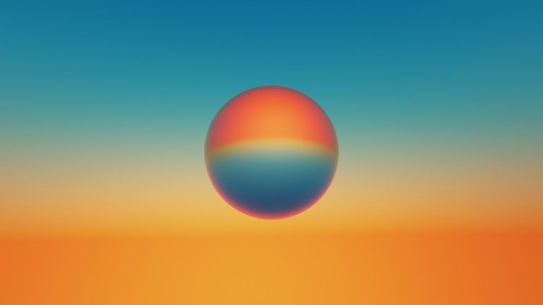 multicolored-sphere-against-sunset-like-sky.jpeg